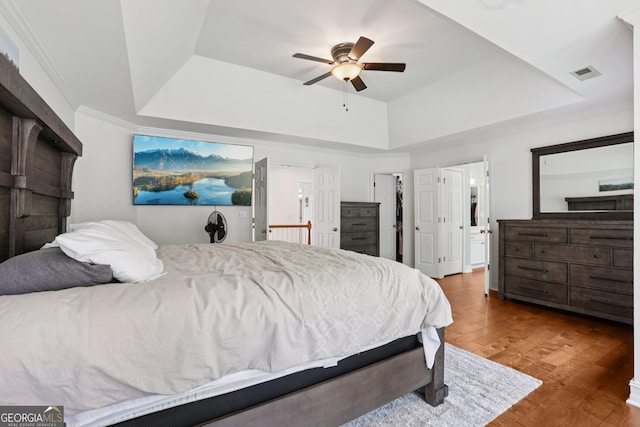 2009 Mclain Rd NW, Acworth, GA 30101 - bedroom featuring a raised ceiling, wood finished floors, ceiling fan, a spacious closet, and ensuite bathroom