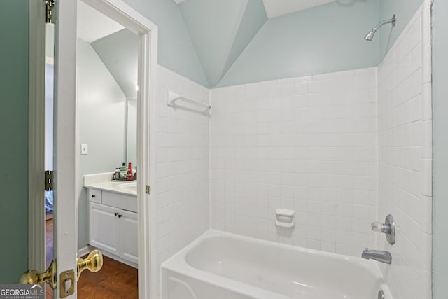 2009 Mclain Rd NW, Acworth, GA 30101 - full bathroom featuring vanity, shower / bathtub combination, wood finished floors, and lofted ceiling