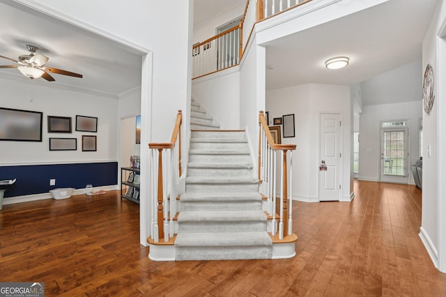 2009 Mclain Rd NW, Acworth, GA 30101 - stairs with ceiling fan, hardwood / wood-style flooring, and crown molding