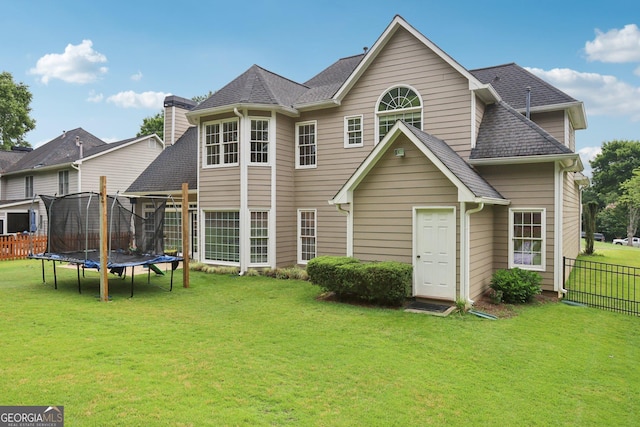 2009 Mclain Rd NW, Acworth, GA 30101 - back of property featuring a trampoline and roof with shingles