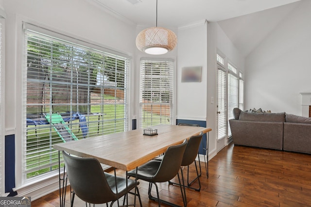 2009 Mclain Rd NW, Acworth, GA 30101 - dining space with healthy amount of natural light, crown molding, and hardwood / wood-style flooring