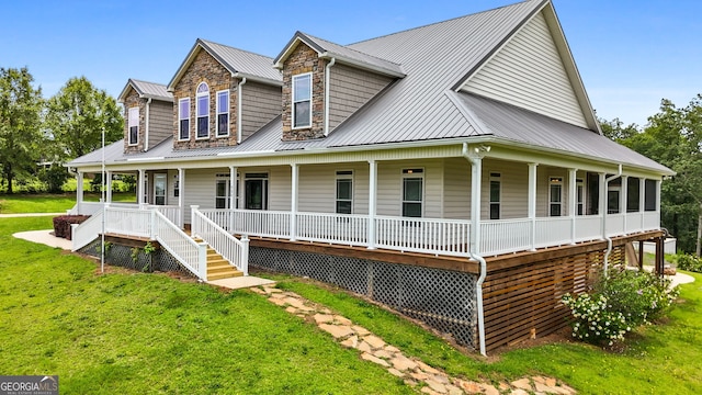 735 Firetower Rd, Thomaston, GA 30286 - view of front facade with covered porch, a front lawn, and a metal roof