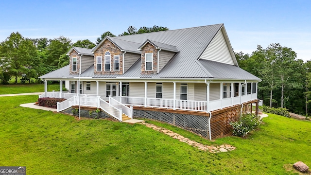 735 Firetower Rd, Thomaston, GA 30286 - country-style home featuring covered porch, a metal roof, and a front lawn