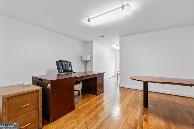 735 Firetower Rd, Thomaston, GA 30286 - home office featuring light wood-style floors and baseboards