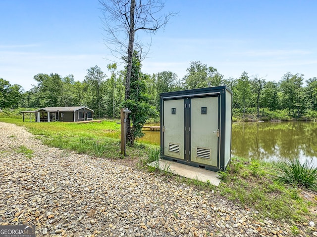 735 Firetower Rd, Thomaston, GA 30286 - view of shed featuring a water view