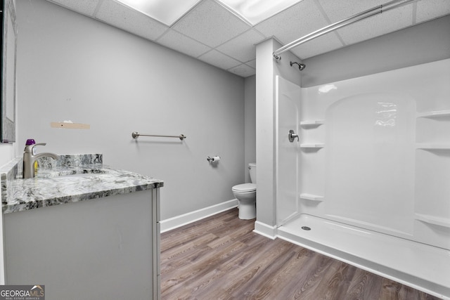 735 Firetower Rd, Thomaston, GA 30286 - full bath with a shower, a drop ceiling, wood finished floors, and vanity