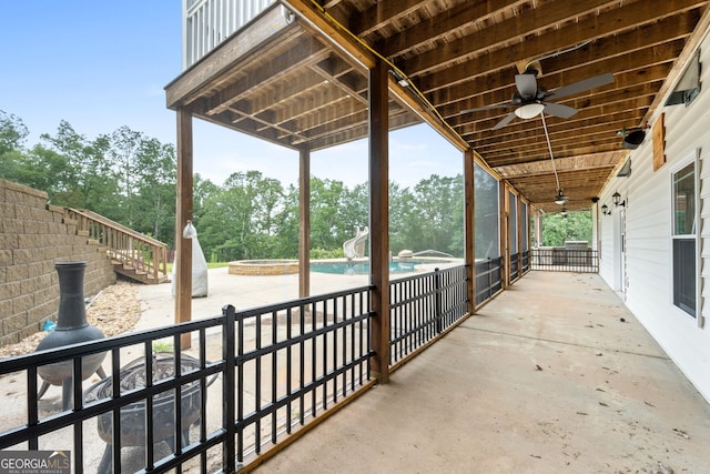 735 Firetower Rd, Thomaston, GA 30286 - view of patio / terrace featuring a ceiling fan, an outdoor pool, stairway, and view of scattered trees