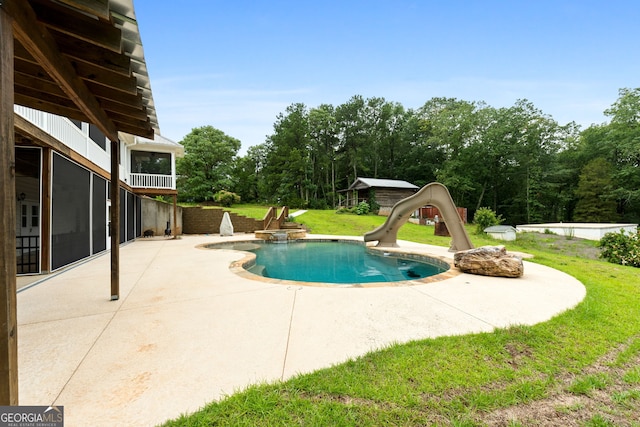 735 Firetower Rd, Thomaston, GA 30286 - swimming pool with a patio area, a water slide, and a yard