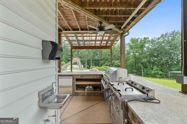 735 Firetower Rd, Thomaston, GA 30286 - view of patio with an outdoor kitchen and a ceiling fan