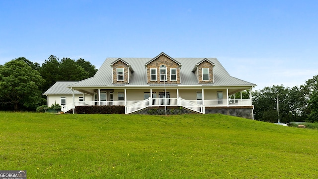 735 Firetower Rd, Thomaston, GA 30286 - farmhouse with covered porch, a front lawn, and a metal roof