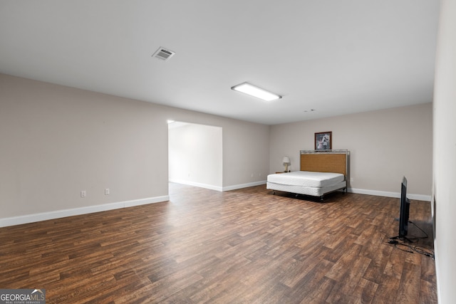 735 Firetower Rd, Thomaston, GA 30286 - bedroom with dark wood-style floors and baseboards
