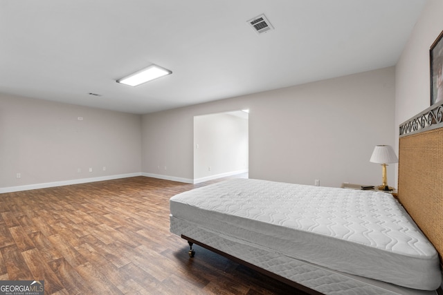 735 Firetower Rd, Thomaston, GA 30286 - bedroom featuring wood finished floors and baseboards