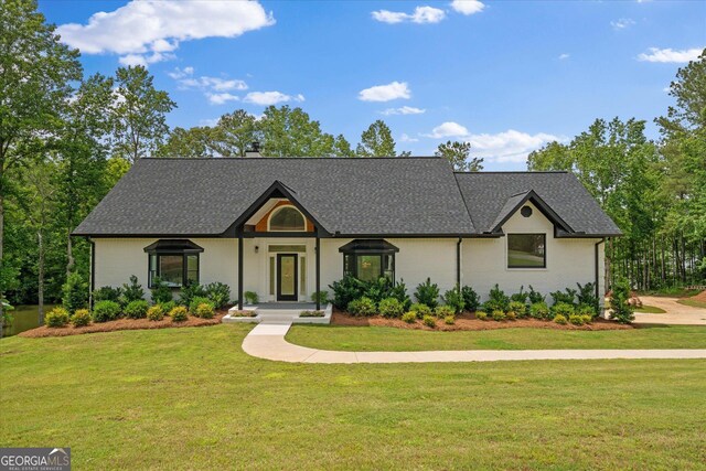 85 Geralds Pt, Wedowee, AL 36278 - view of front of property featuring a front yard and roof with shingles