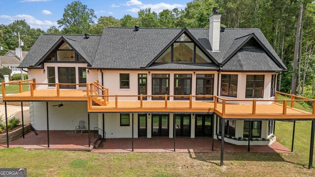 85 Geralds Pt, Wedowee, AL 36278 - back of property with a patio area, a shingled roof, a yard, and a wooden deck