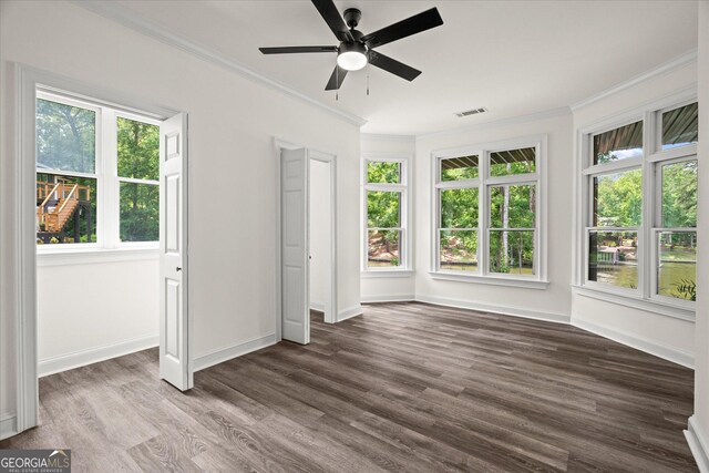 85 Geralds Pt, Wedowee, AL 36278 - unfurnished bedroom featuring ornamental molding, dark wood-type flooring, and a ceiling fan