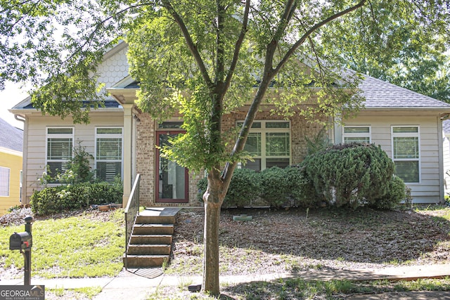 6127 Landers Loop, Fairburn, GA 30213 - view of property hidden behind natural elements featuring brick siding
