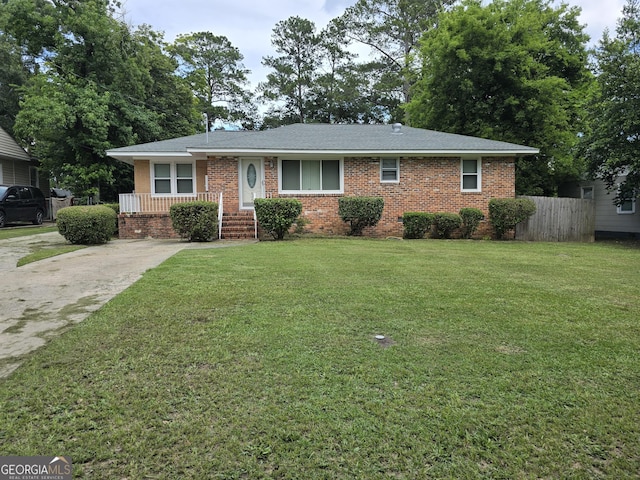 4322 Summerhill Dr, Macon, GA 31204 - view of front of home with brick siding, driveway, and roof with shingles