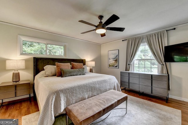 595 Glenforest Rd, Sandy Springs, GA 30328 - bedroom with wood finished floors, ceiling fan, and crown molding