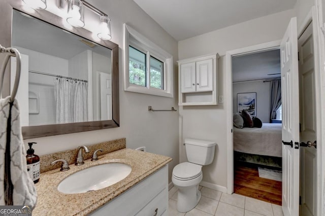 595 Glenforest Rd, Sandy Springs, GA 30328 - bathroom with tile patterned floors, vanity, ensuite bath, and a shower with shower curtain