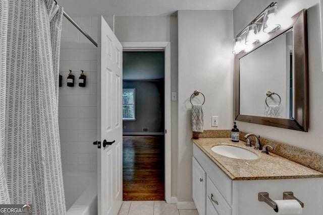 595 Glenforest Rd, Sandy Springs, GA 30328 - bathroom with vanity, shower / bath combo, and tile patterned floors