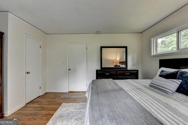 595 Glenforest Rd, Sandy Springs, GA 30328 - bedroom featuring wood finished floors and baseboards