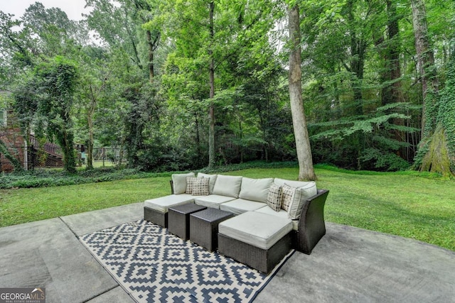 595 Glenforest Rd, Sandy Springs, GA 30328 - view of patio featuring an outdoor living space and a forest view
