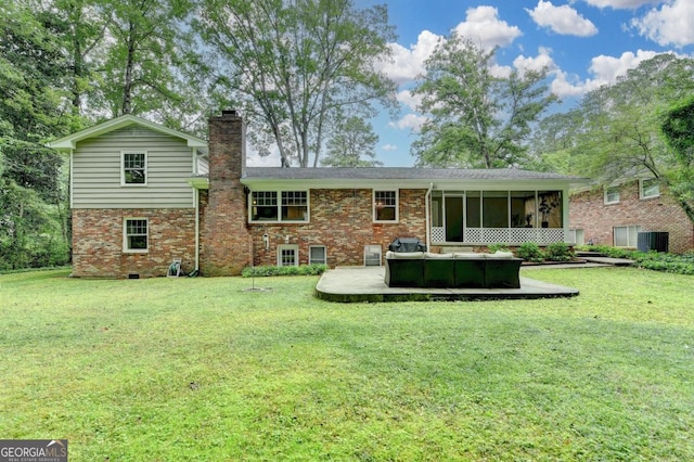 595 Glenforest Rd, Sandy Springs, GA 30328 - back of property with a sunroom, brick siding, a chimney, and a patio