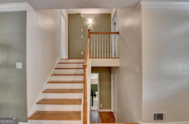 595 Glenforest Rd, Sandy Springs, GA 30328 - stairway with baseboards and wood finished floors