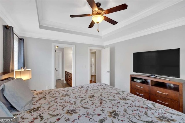 6 Majestic Oaks Way NE, Rome, GA 30165 - bedroom featuring a tray ceiling, ornamental molding, ensuite bathroom, and a ceiling fan