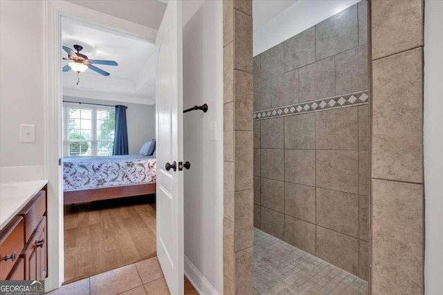 6 Majestic Oaks Way NE, Rome, GA 30165 - ensuite bathroom with ornamental molding, walk in shower, vanity, a ceiling fan, and wood finished floors