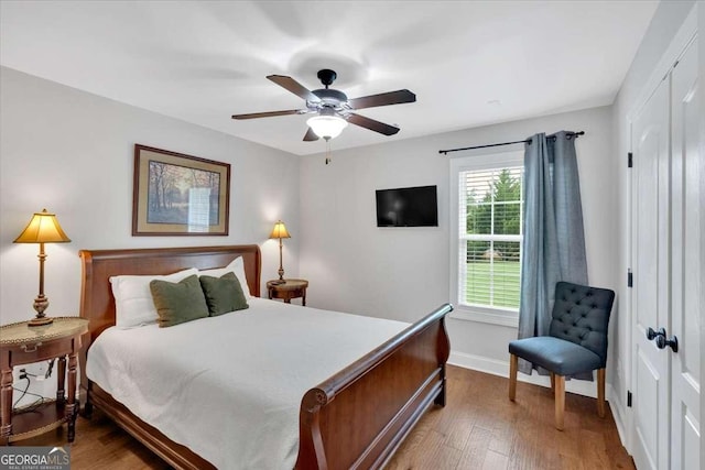 6 Majestic Oaks Way NE, Rome, GA 30165 - bedroom with a closet, wood finished floors, and a ceiling fan