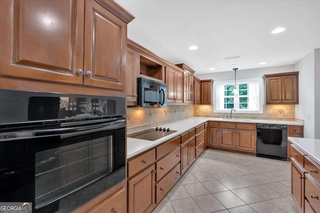 6 Majestic Oaks Way NE, Rome, GA 30165 - kitchen featuring black appliances, decorative backsplash, brown cabinets, decorative light fixtures, and recessed lighting