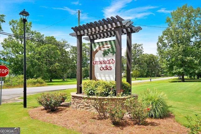 6 Majestic Oaks Way NE, Rome, GA 30165 - community sign featuring a lawn and view of wooded area