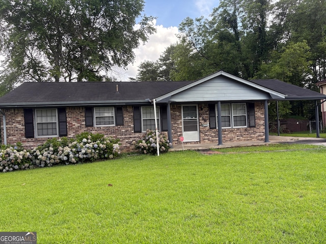 266 Ridge Trl, Riverdale, GA 30274 - single story home with brick siding, a front lawn, and an attached carport