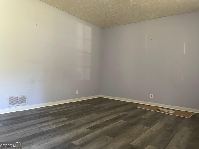 266 Ridge Trl, Riverdale, GA 30274 - spare room with wood finished floors and a textured ceiling