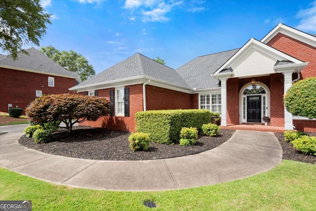 411 Hickory Fairway Ct, Woodstock, GA 30188 - view of property exterior featuring brick siding and roof with shingles