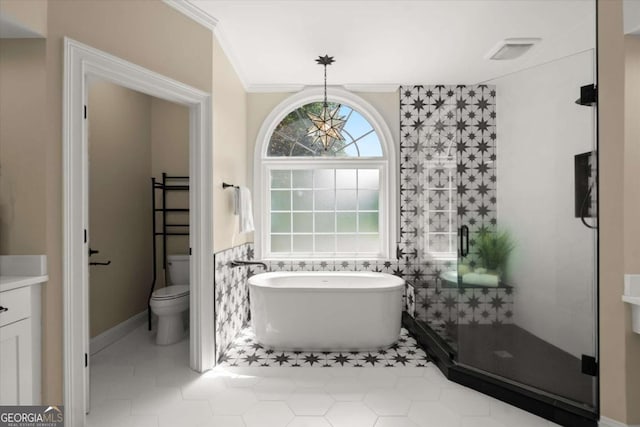 411 Hickory Fairway Ct, Woodstock, GA 30188 - bathroom featuring a freestanding bath, crown molding, tile patterned flooring, a shower stall, and vanity