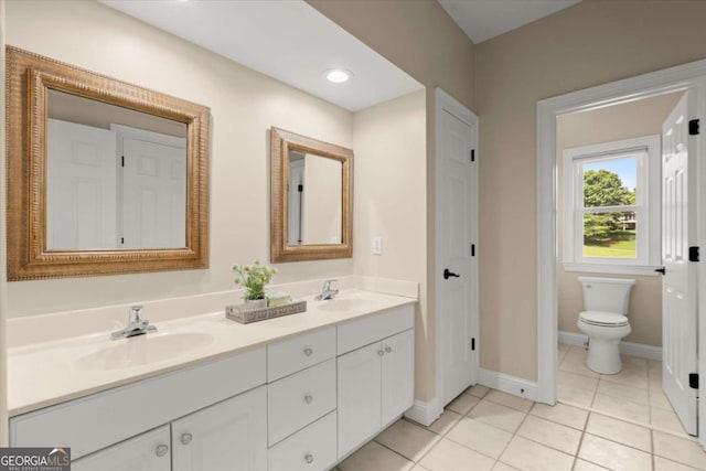 411 Hickory Fairway Ct, Woodstock, GA 30188 - bathroom featuring double vanity and tile patterned floors