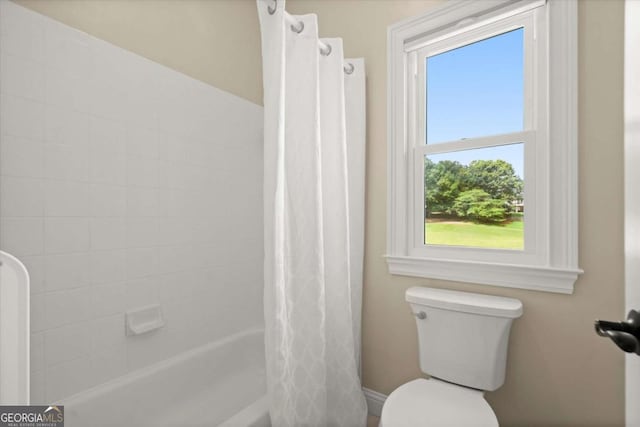 411 Hickory Fairway Ct, Woodstock, GA 30188 - bathroom with plenty of natural light and shower / tub combo
