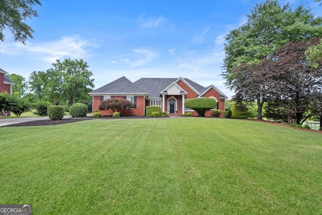 411 Hickory Fairway Ct, Woodstock, GA 30188 - ranch-style home featuring a front yard and brick siding