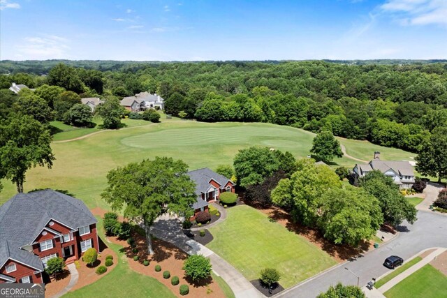 411 Hickory Fairway Ct, Woodstock, GA 30188 - bird's eye view of a local golf course and a heavily wooded area