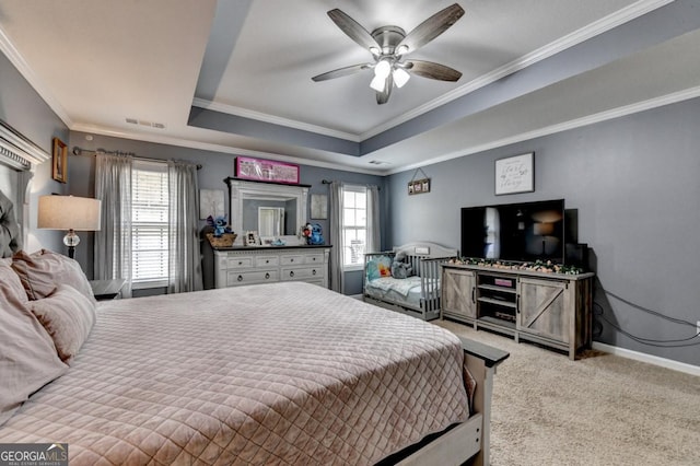 1811 Alberta Ln, Winder, GA 30680 - bedroom featuring light carpet, a tray ceiling, crown molding, and ceiling fan