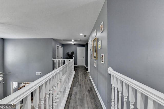 1811 Alberta Ln, Winder, GA 30680 - hallway with wood finished floors, an upstairs landing, and recessed lighting