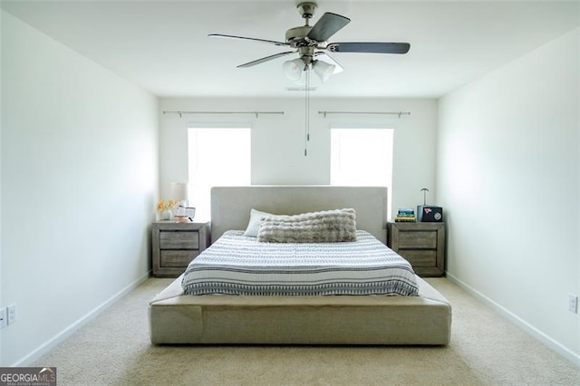 2159 Redfern, Dacula, GA 30019 - carpeted bedroom featuring multiple windows and a ceiling fan