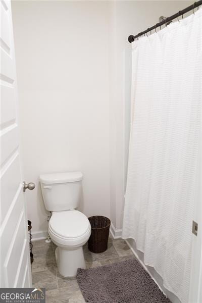 2159 Redfern, Dacula, GA 30019 - bathroom with toilet and a shower with shower curtain