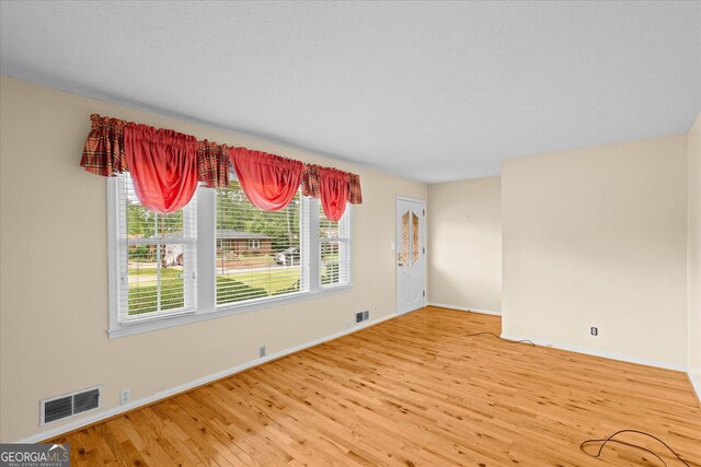 106 Lakeview Dr, Carrollton, GA 30117 - empty room featuring wood finished floors and baseboards