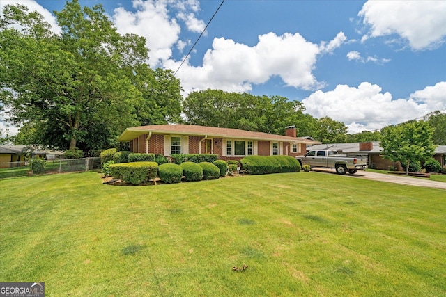 106 Lakeview Dr, Carrollton, GA 30117 - view of front of home with brick siding and a chimney