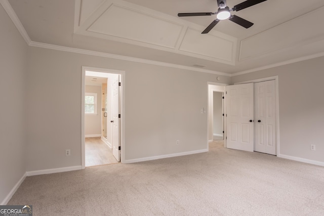 5674 Mountain Cres, Stone Mountain, GA 30087 - unfurnished bedroom featuring light carpet, crown molding, ensuite bath, a closet, and a ceiling fan