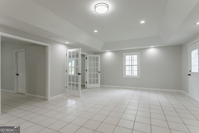 5674 Mountain Cres, Stone Mountain, GA 30087 - unfurnished room featuring plenty of natural light, french doors, light tile patterned floors, recessed lighting, and a tray ceiling