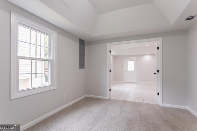 5674 Mountain Cres, Stone Mountain, GA 30087 - tiled empty room featuring electric panel, carpet, and a raised ceiling